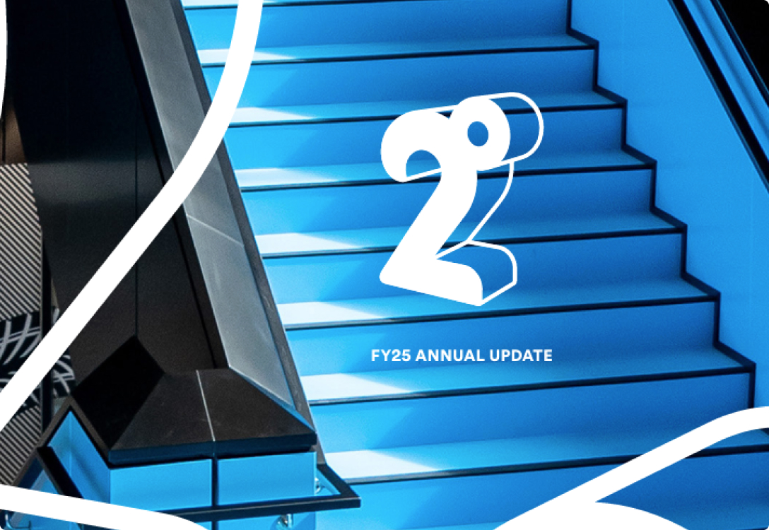 annual report business landing overview  white 2degrees logo overlayed on a photo of the blue stairs in the 2degrees head office