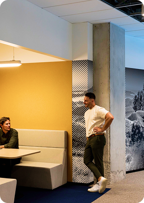 Photo of staff in the 2degrees office in one of the open meeting areas