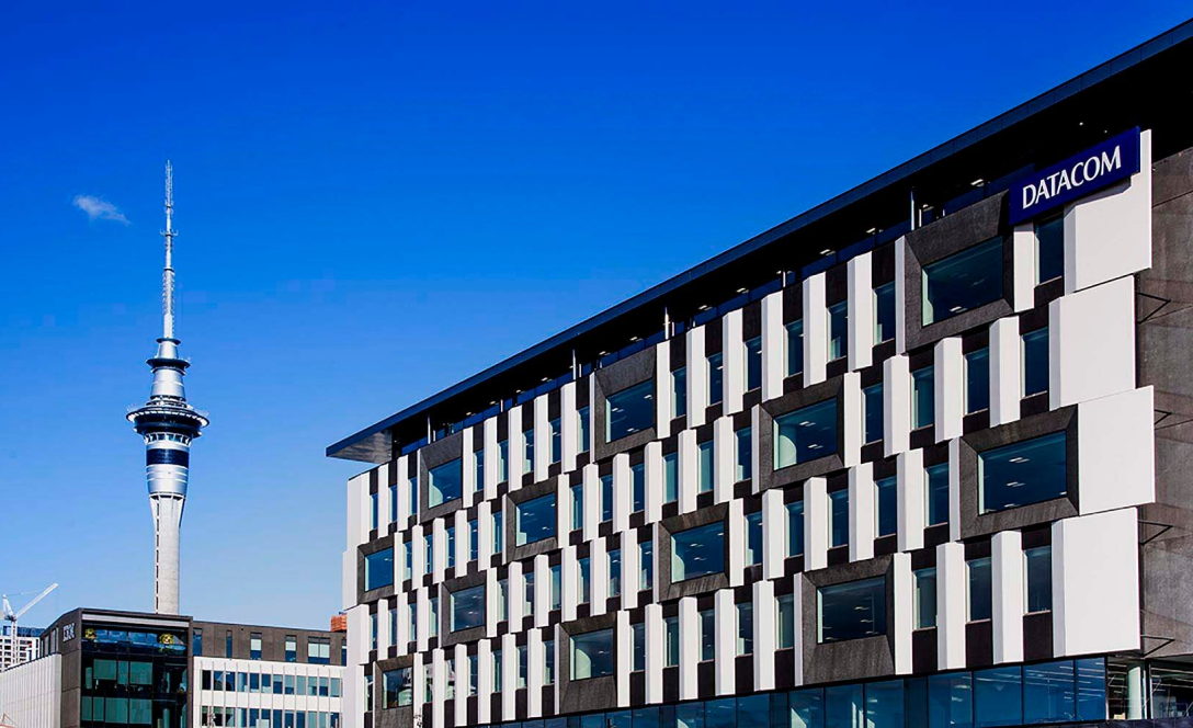 Photo of the Datacom offices in Auckland with the Sky Tower in the background